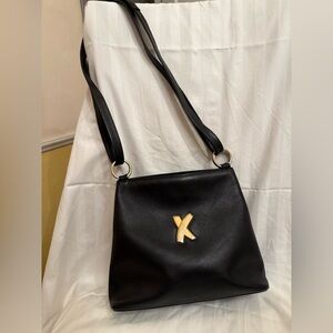 Paloma Picasso shoulder bag can be adjusted to be crossbody.